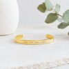 Gold This Too Shall Pass But Fuck This Shit Cuff Bracelet on soft neutral background