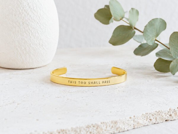 Gold This Too Shall Pass But Fuck This Shit Cuff Bracelet on soft neutral background